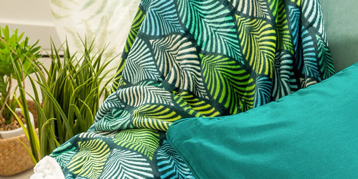 Manta estampado follaje tropical