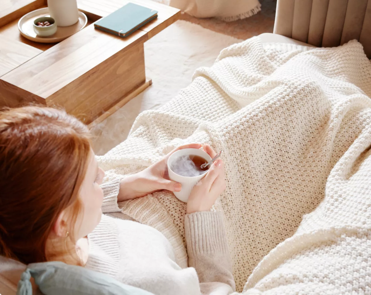 Beige strikket hygge-plaid