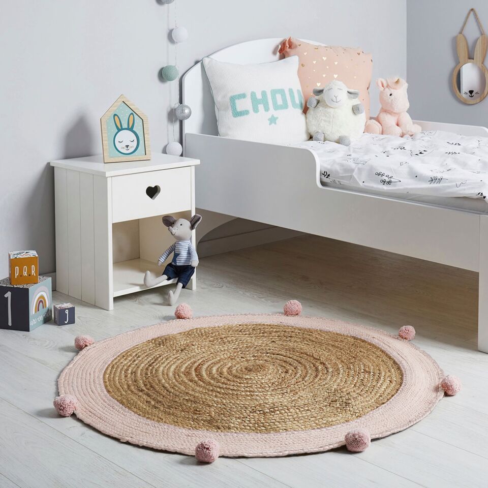 Runder Kinderzimmerteppich mit rosa Bommeln