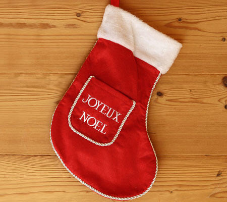 calcetín rojo y blanco de feliz navidad