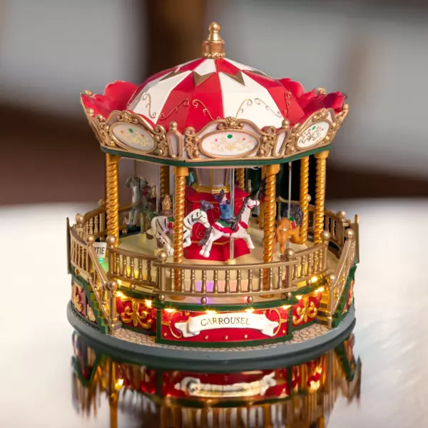 Verlichte en muzikale draaimolen Nicolas