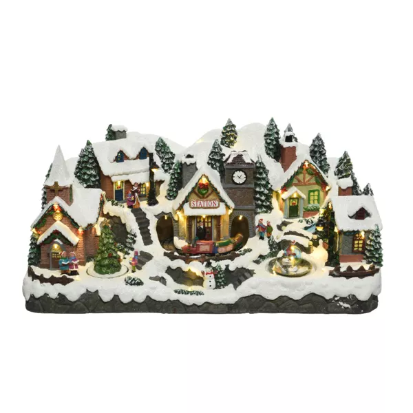 Village de Noël lumineux Montagne enneigée