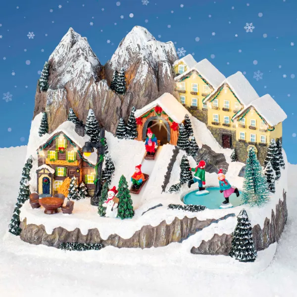 Beleuchtetes Weihnachtsdorf mit Musik Chalets en montagne