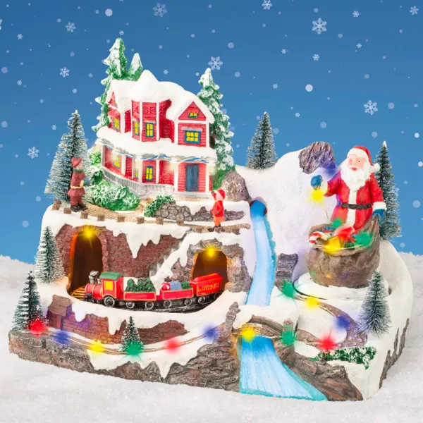 Beleuchtetes Weihnachtsdorf mit Musik Père Noël en montagne