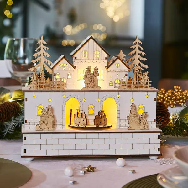 Village de Noël en bois lumineux et musical à piles (21 x H24 cm) Villageois en fête