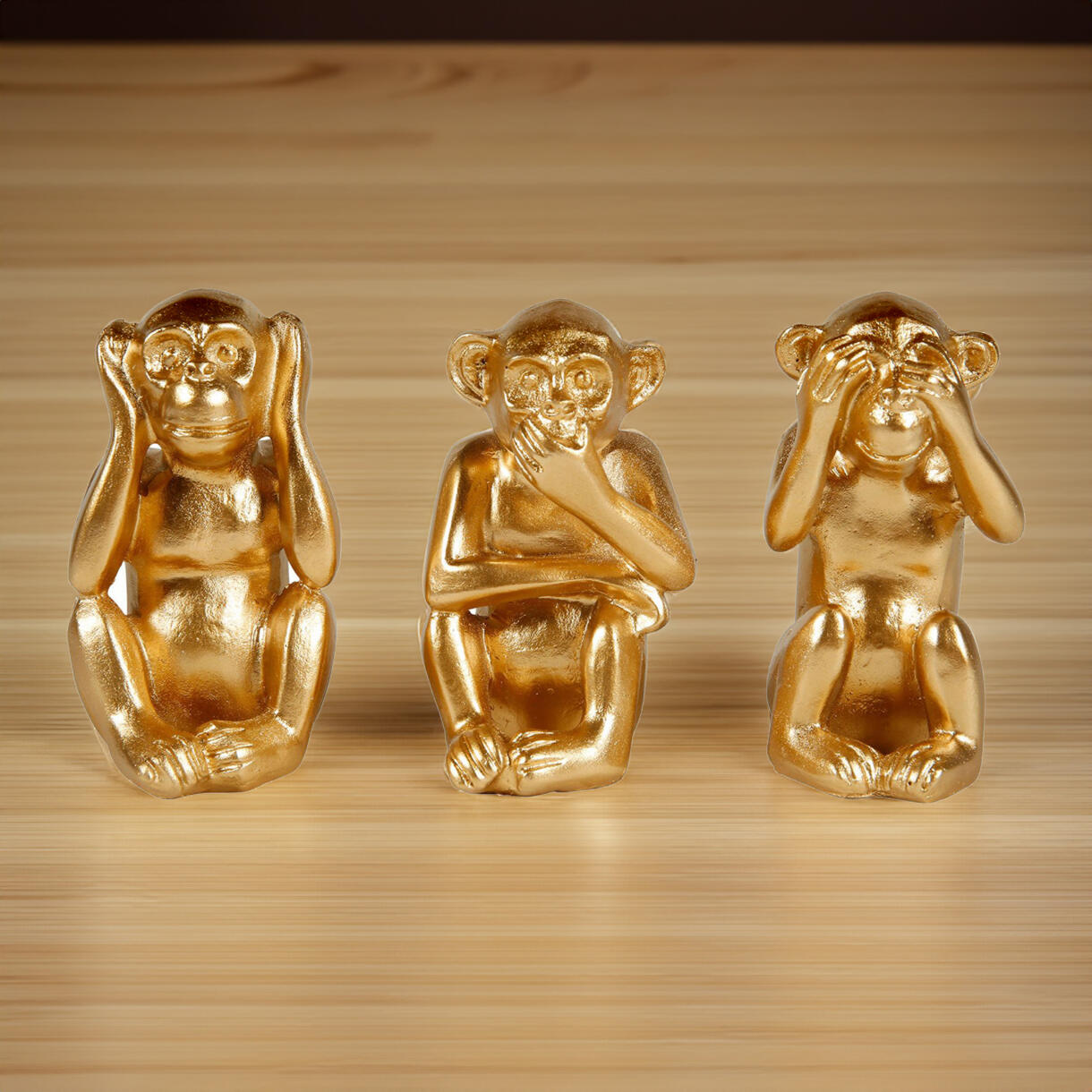 Juego de 3 monos sabios de oro 1