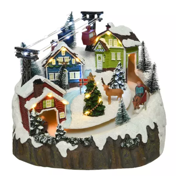 Pueblo de Navidad luminoso y musical vacaciones en la nieve	 2