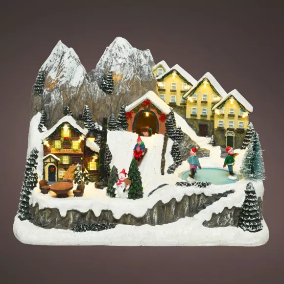 Verlicht en muzikaal kerstdorp Bergchalets