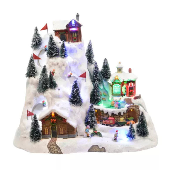 Verlicht en muzikaal Kerstdorp Geanimeerd skistation