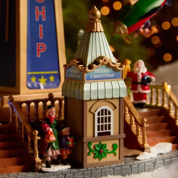 Village de Noël lumineux, animé et musical (H47 cm) Manège avions effet flash