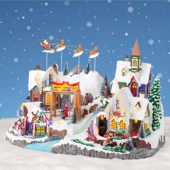 Villaggio di Natale luminoso e musicale Notte di Natale