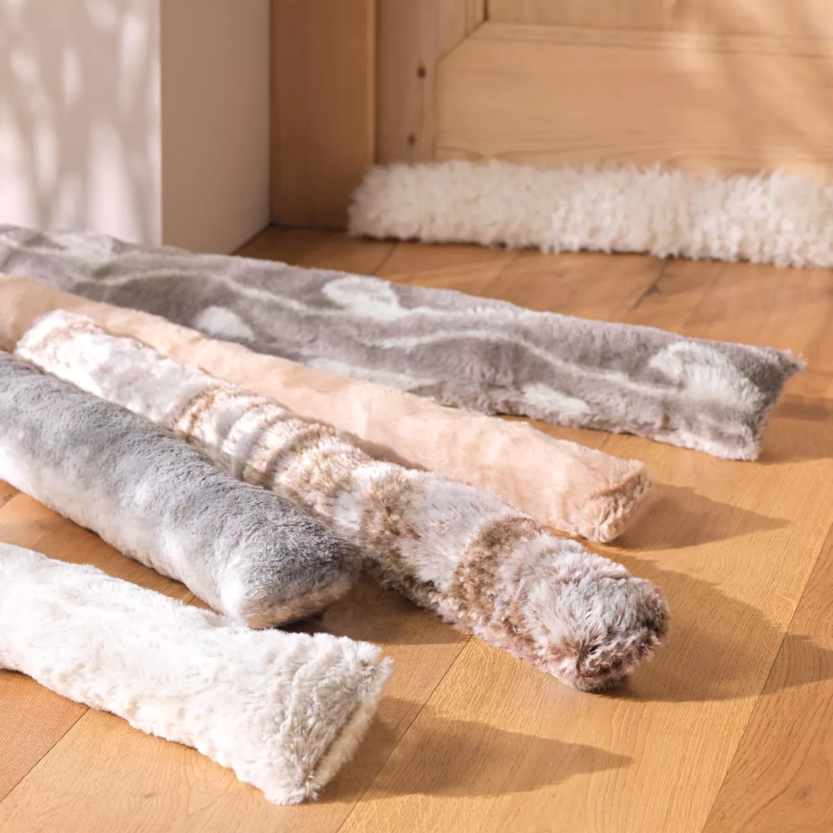 Zugluftstopper aus Kunstfell (80 x 10 cm) Schaf Cremeweiß