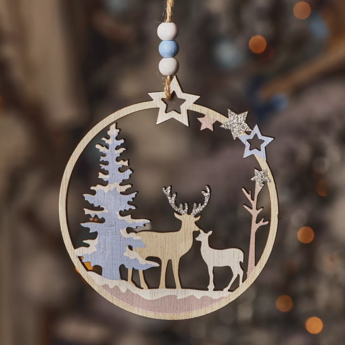 Decorazione natalizia sospesa in legno (D11 cm) Renna e cerva nel bosco Blu