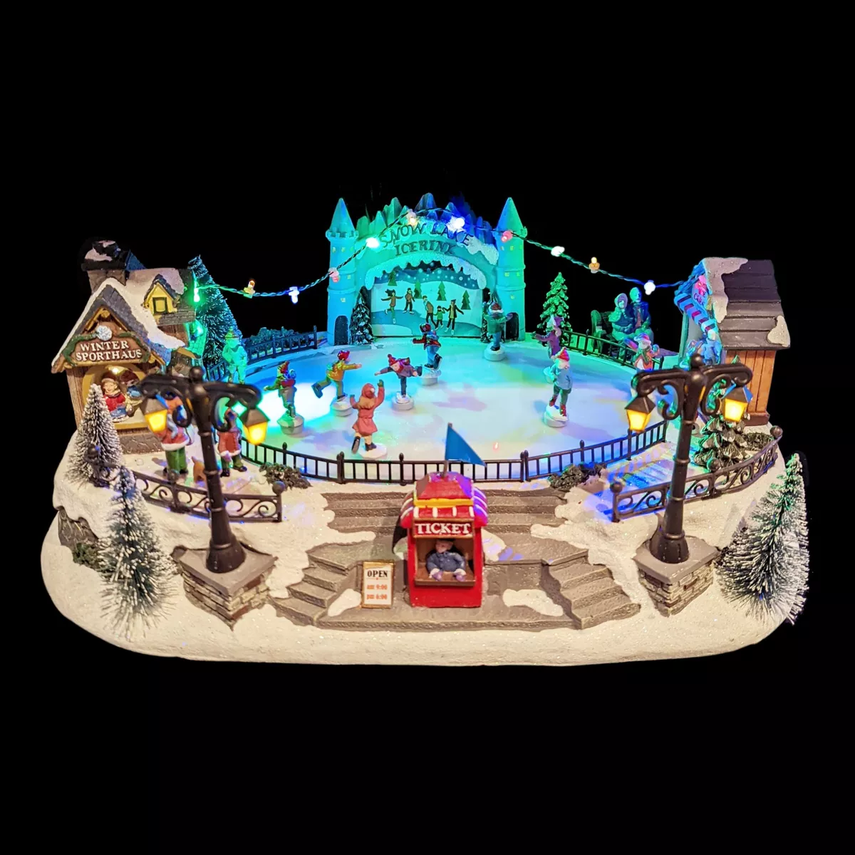 Scena di vita illuminata e musicale Pista di patinaggio esterna