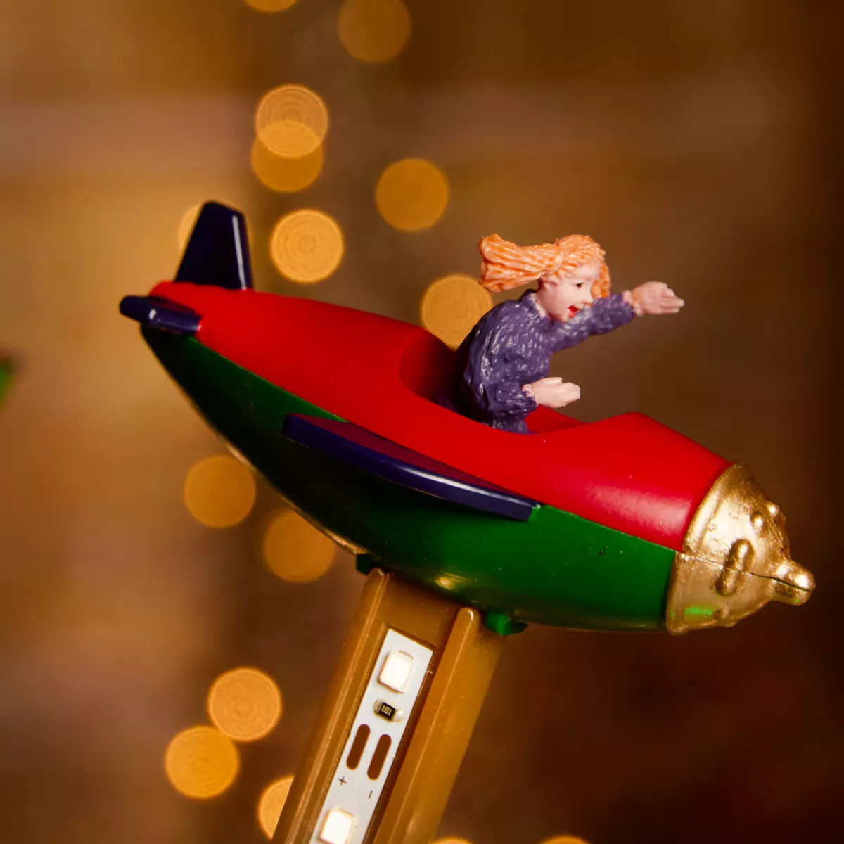 Pueblo de Navidad luminoso, animado y musical (H47 cm) Carrusel de aviones
