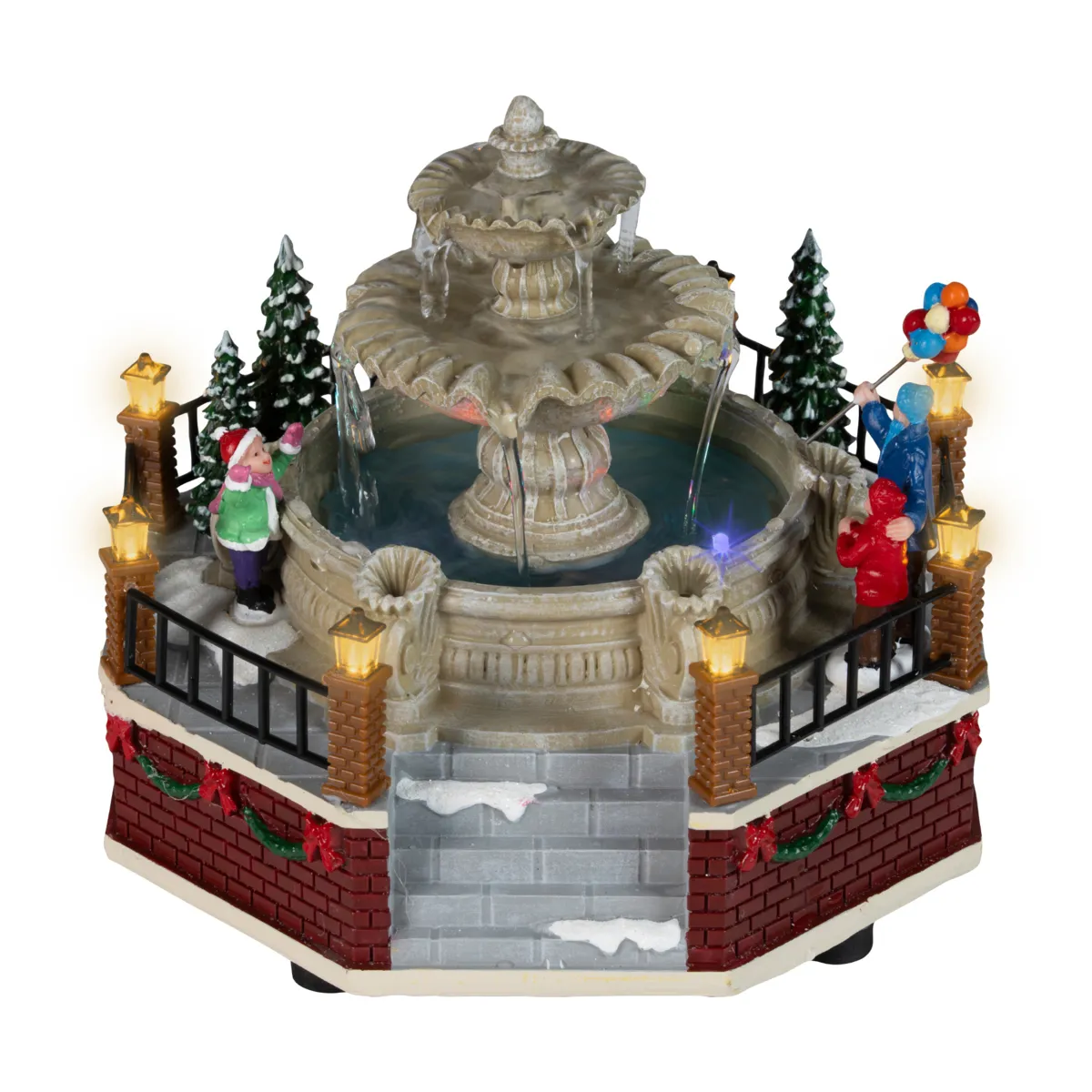 Villaggio di Natale luminoso musicale e animato a pile (H15 cm) Fontana con colori che cambiano