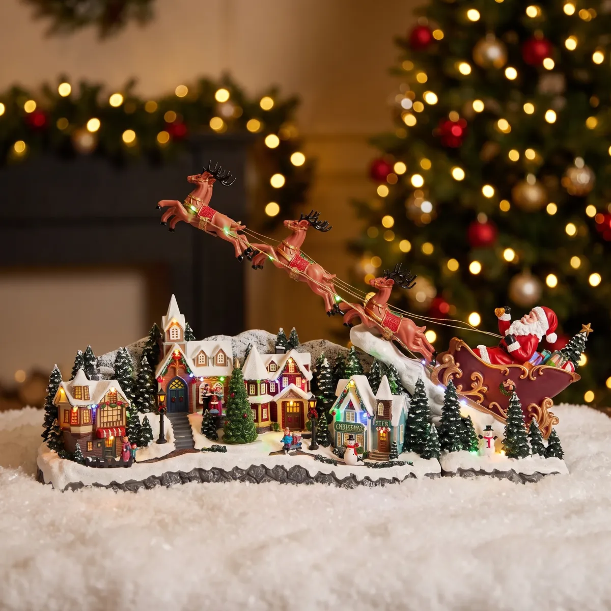 Villaggio di Natale luminoso e animato (H47 cm) La slitta nel cielo