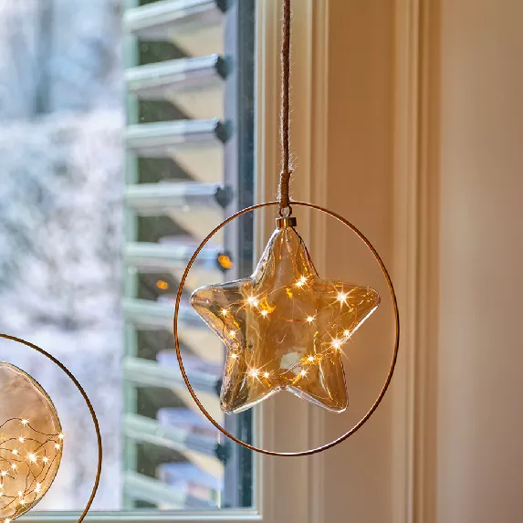 Suspension lumineuse � piles 15 LED (D26 cm) �toile d�Hiver Ambre/blanc chaud