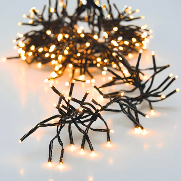 Guirlande lumineuse 8,40 m 1152 LED c�ble noir Boa Blanc chaud 