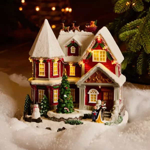 Oplyst, musikalsk og animeret landsbyhus p� batteri (H23 cm) Camden Street