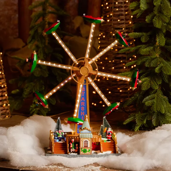 Pueblo de Navidad luminoso, animado y musical (H47 cm) Carrusel de aviones