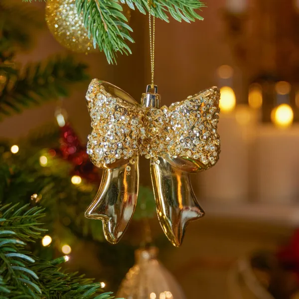 Sospensione natalizia (H7 cm) Fiocco glitterato Oro chiaro